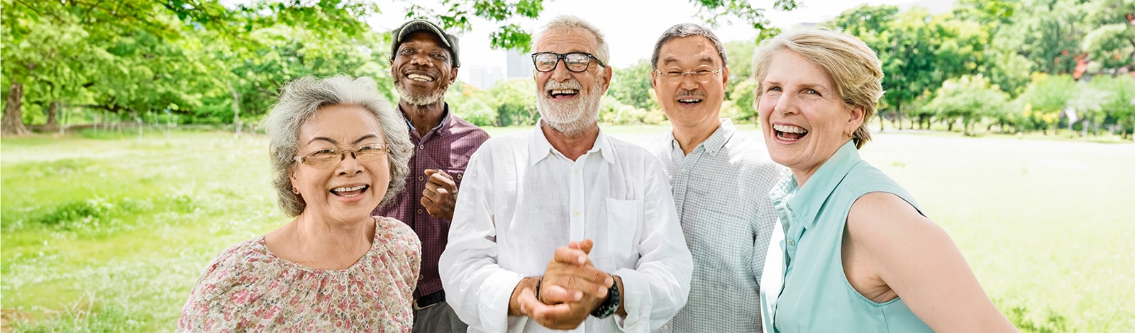 several mature adults enjoying time together in the outdoors