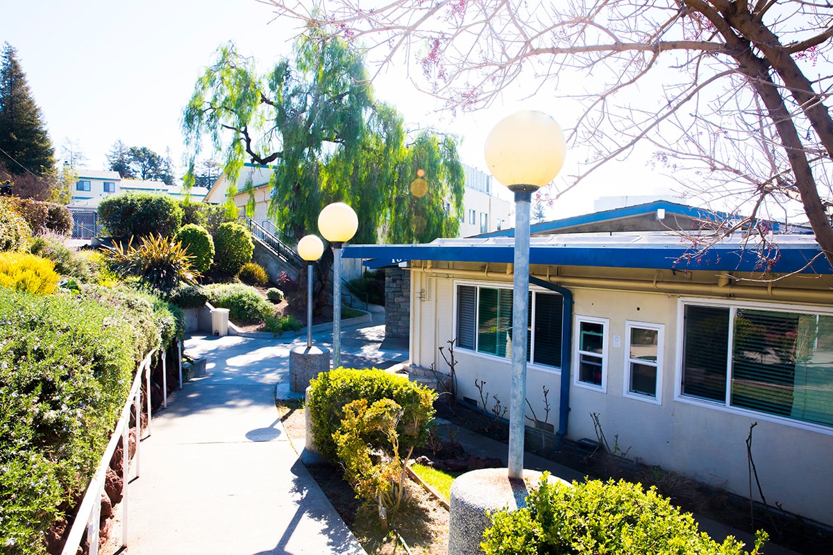 Light posts in an outdoor area outside of All Saints