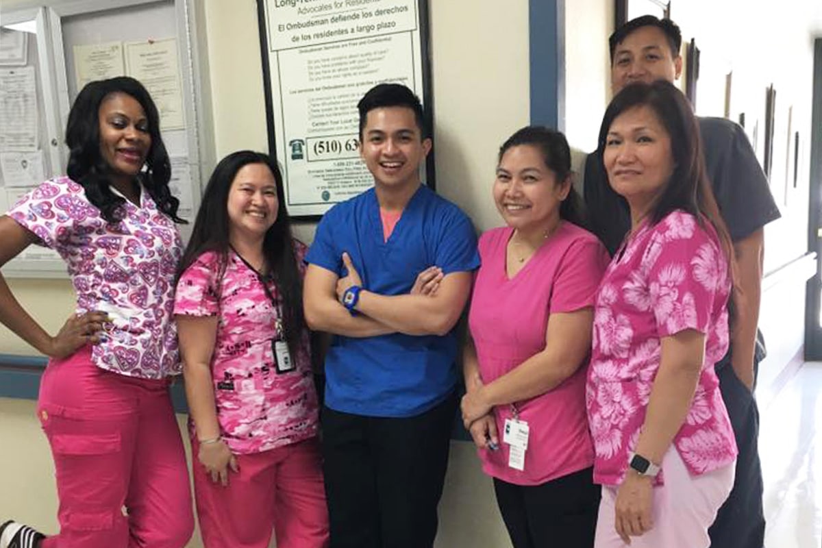 A group of doctors and nurses working at All Saints