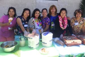 A group of employees at an event at All Saints
