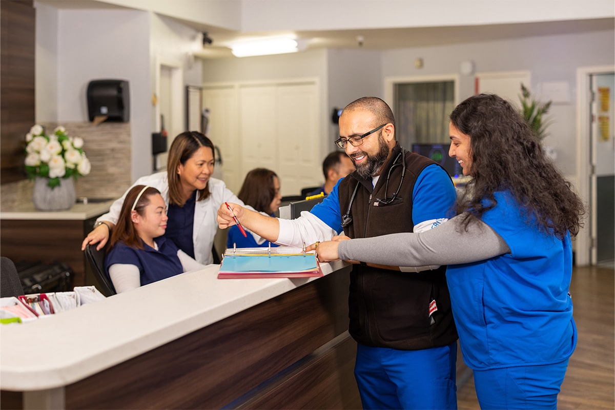All Saints Post Healthcare staff at the front desk
